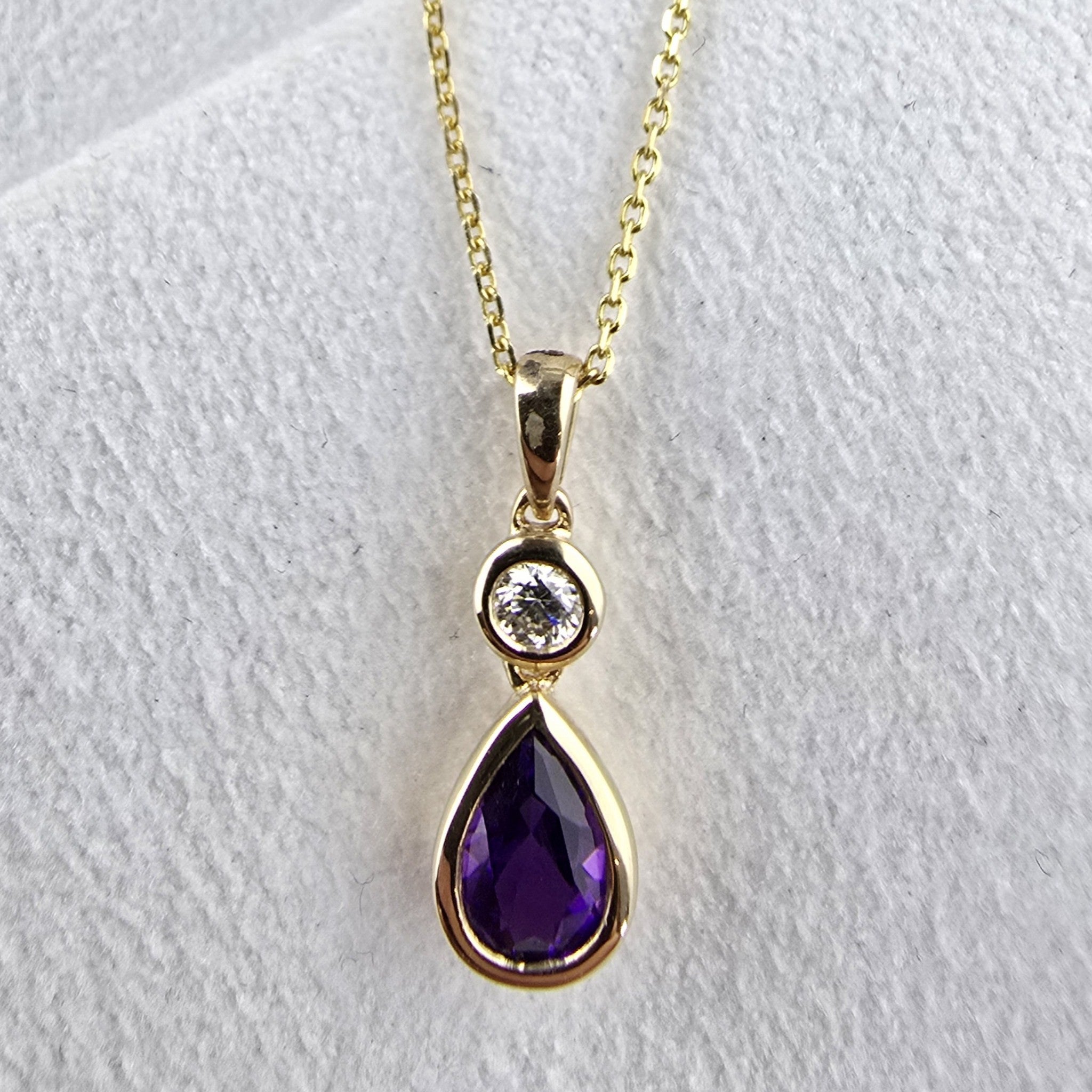 Yellow Gold Pear cut amethyst and diamond pendant