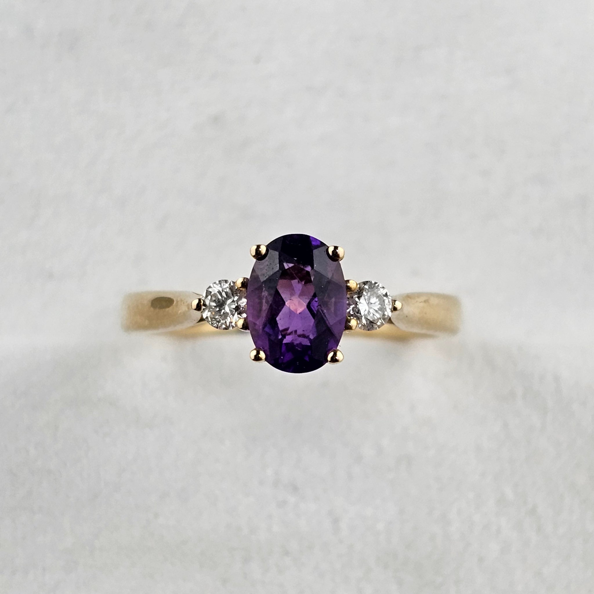 Oval Amethyst and Diamond Trilogy Ring