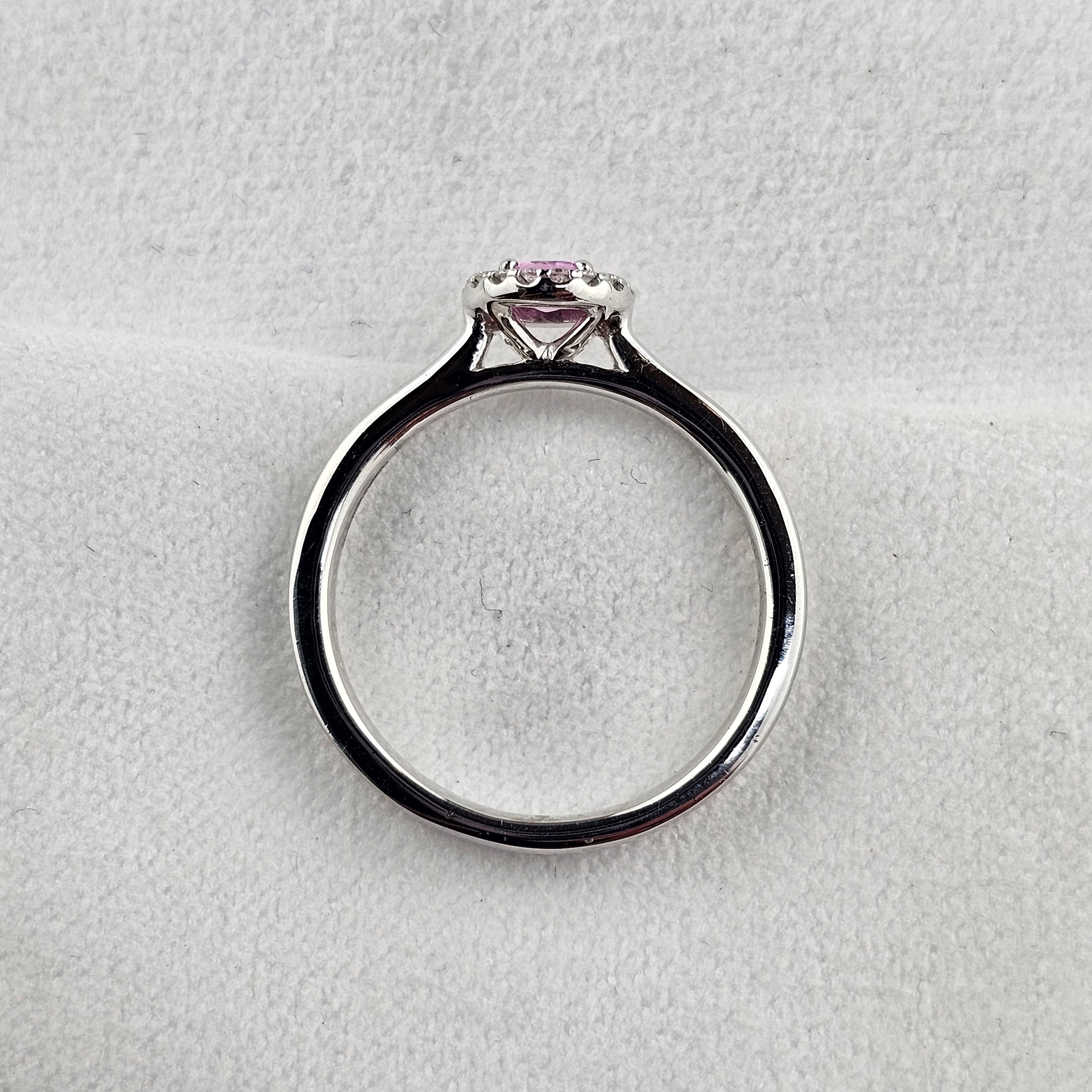 Round Cut Pink Sapphire and Diamond Halo Ring