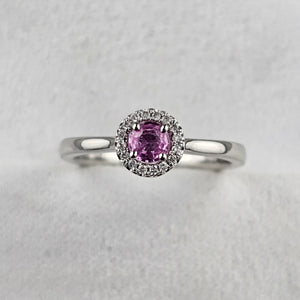 Round Cut Pink Sapphire and Diamond Halo Ring