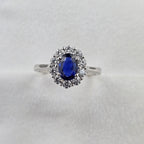 Oval Sapphire and Diamond Cluster Ring