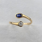 Open Twist Oval Sapphire and Round Diamond Ring