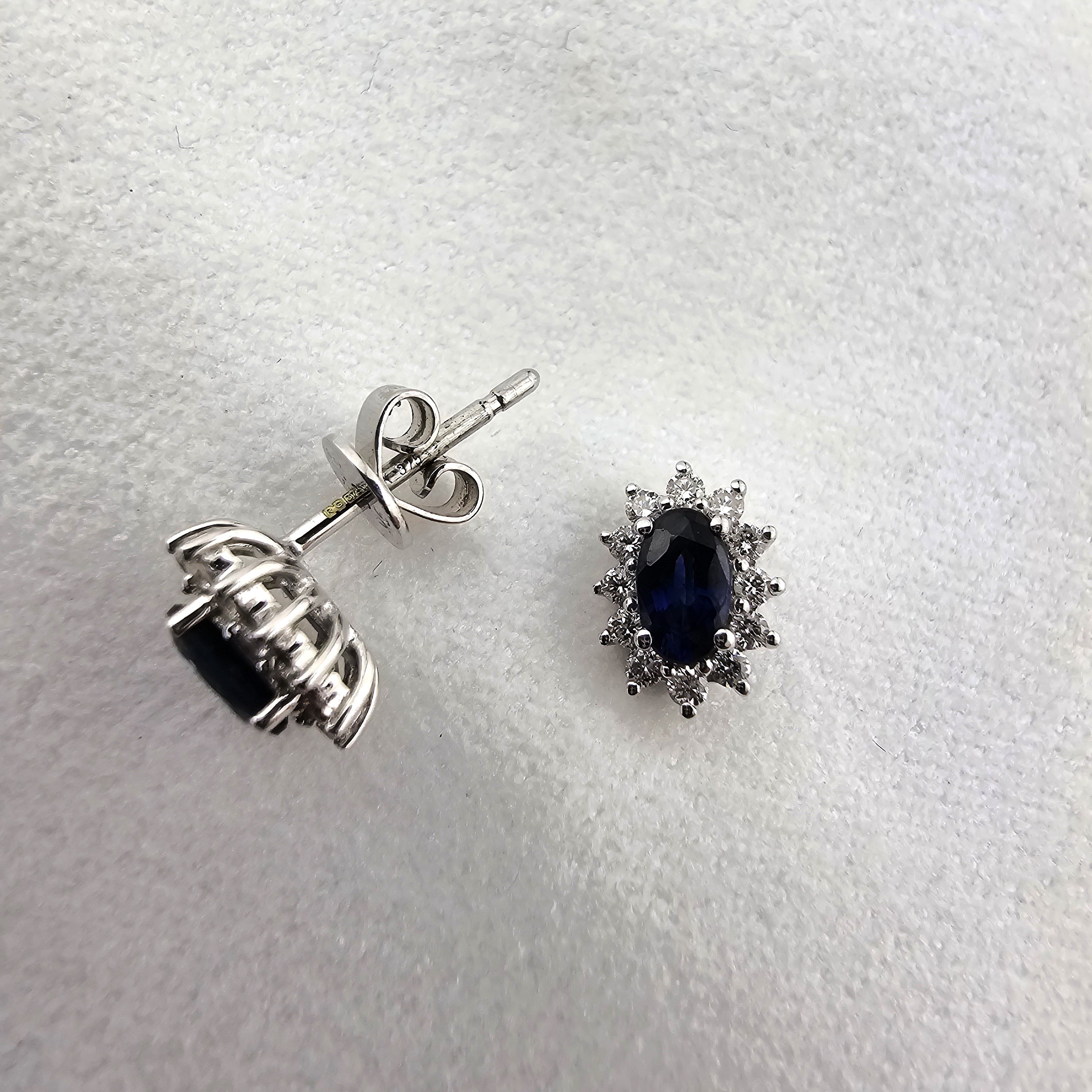 Oval sapphire traditional cluster earrings