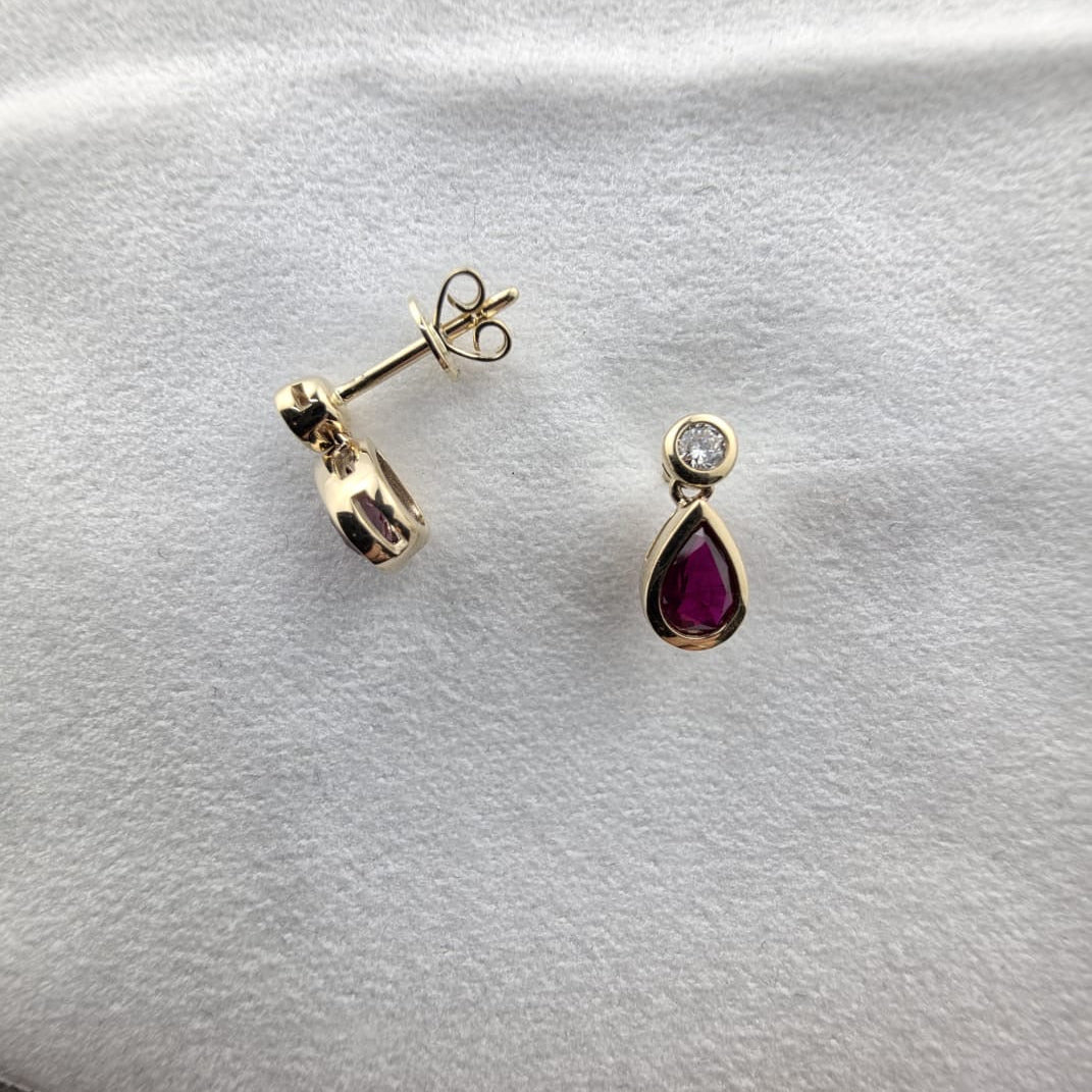 Round Diamond and Pear Ruby Stud