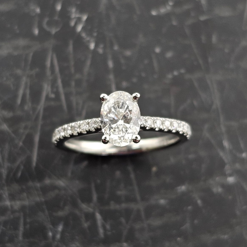 Oval Solitaire with Diamond Shoulders