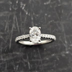 Oval Solitaire with Diamond Shoulders