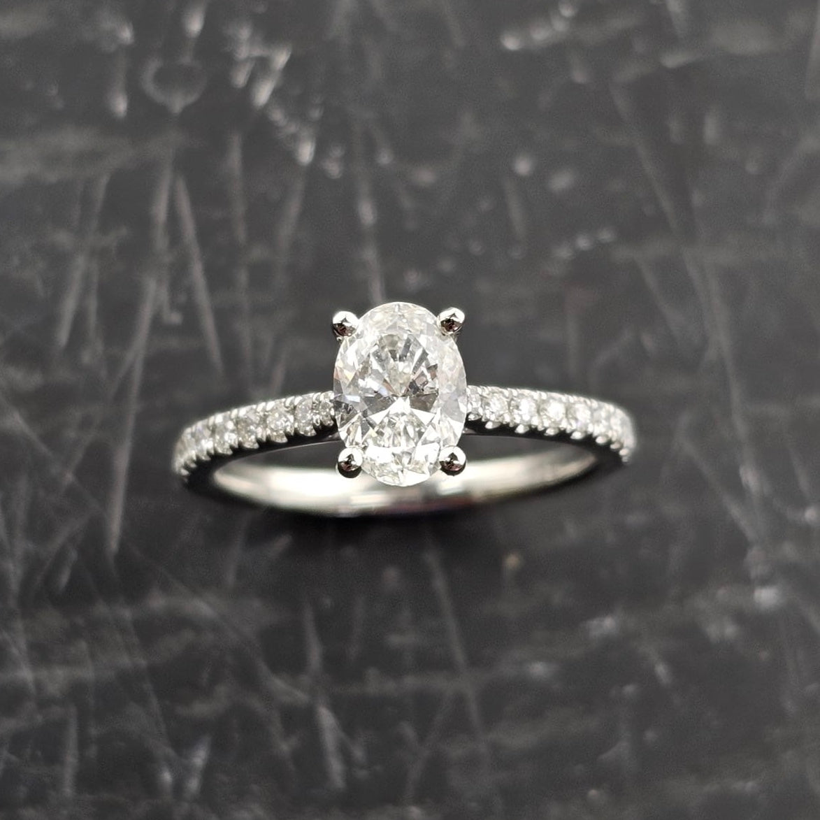 Oval Solitaire with Diamond Shoulders