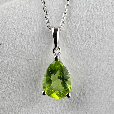 Pear Cut Caw Set Peridot Pendant