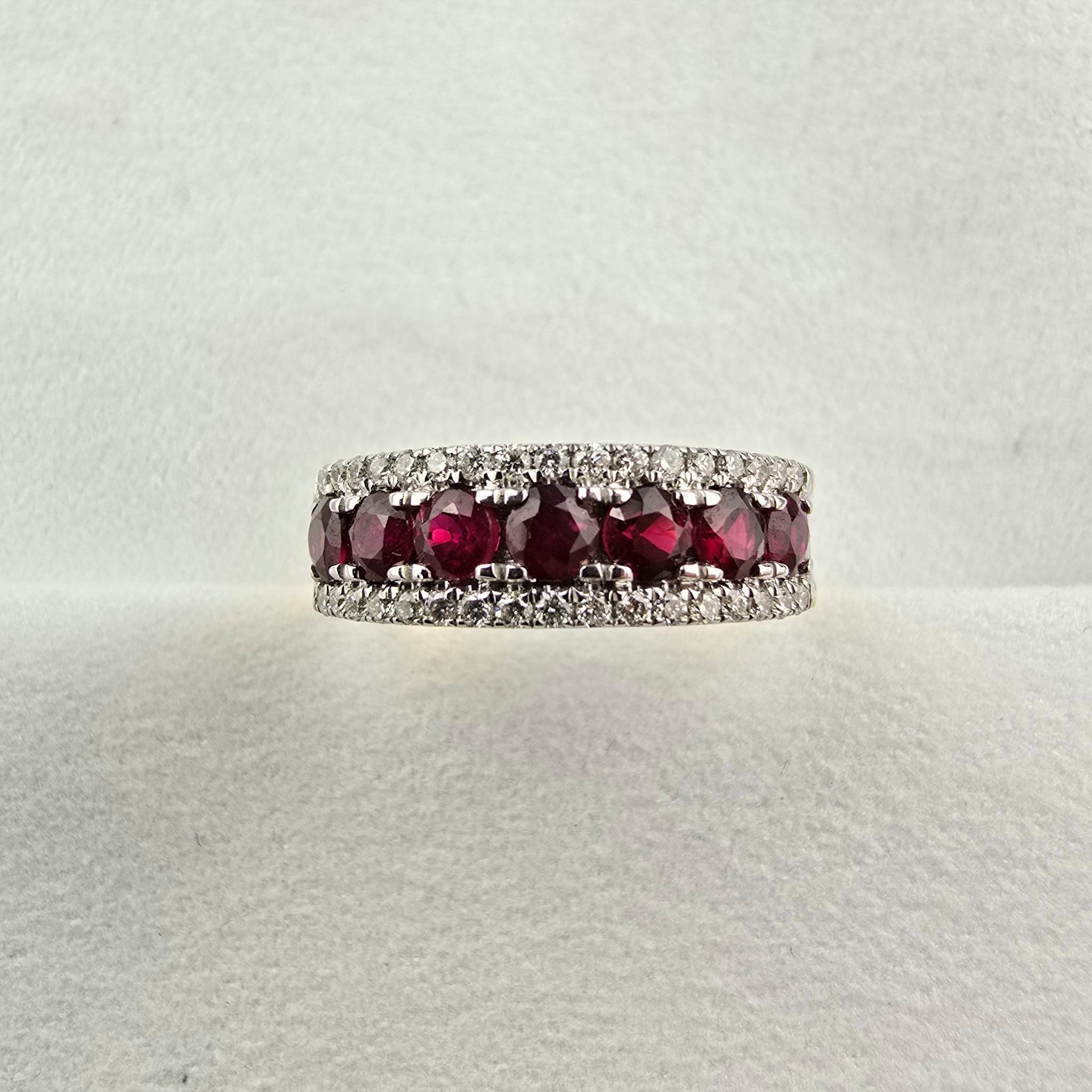 Ruby and diamond claw set dress ring