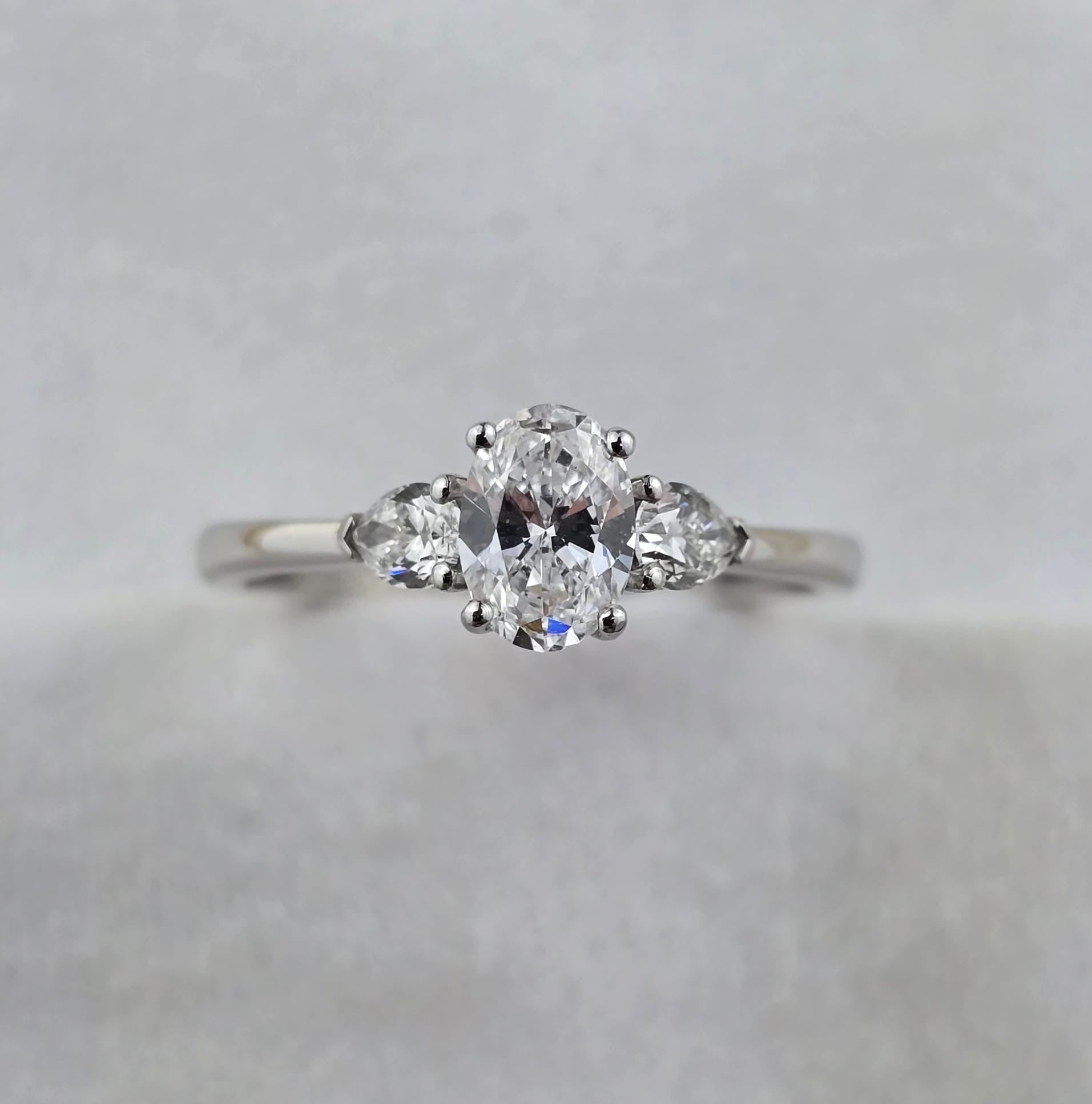 Oval and Pear Cut Diamond Trilogy Ring