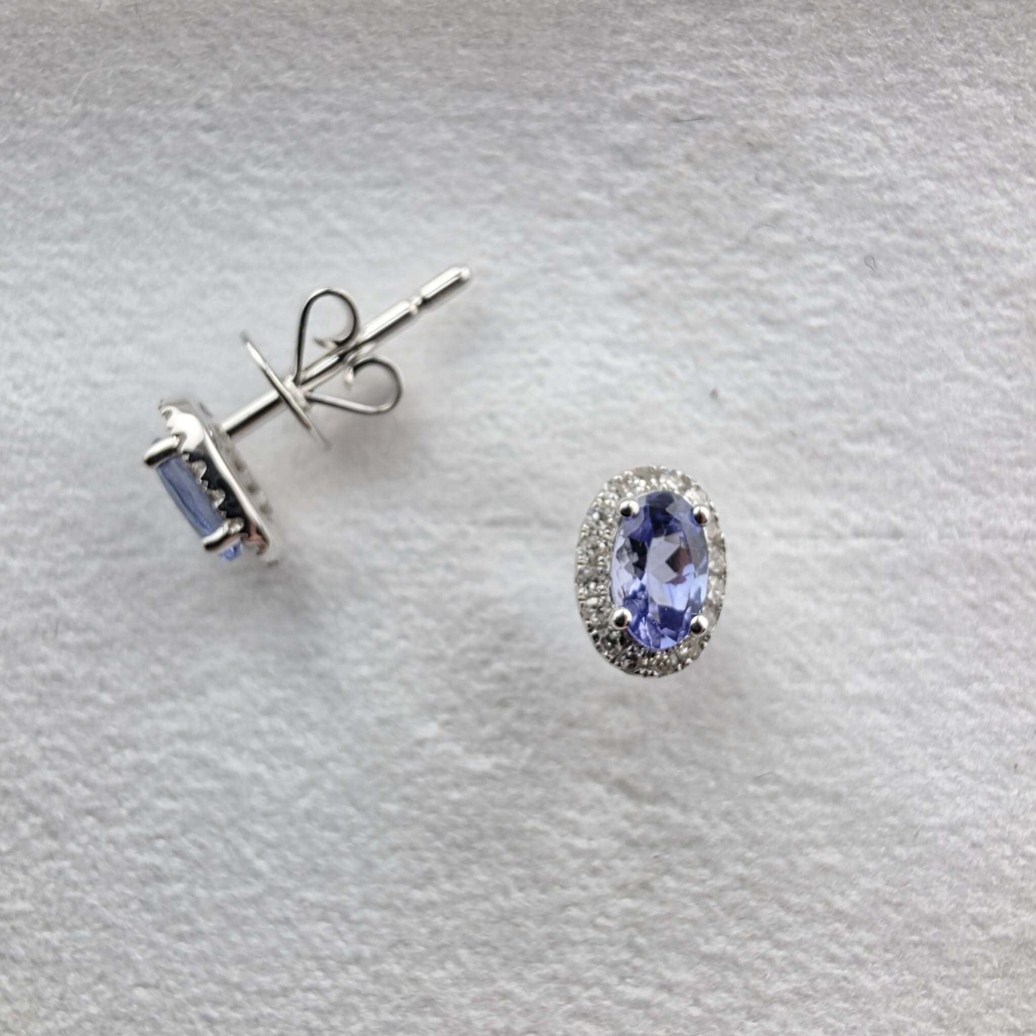 Oval Tanzanite and Diamond Halo Studs