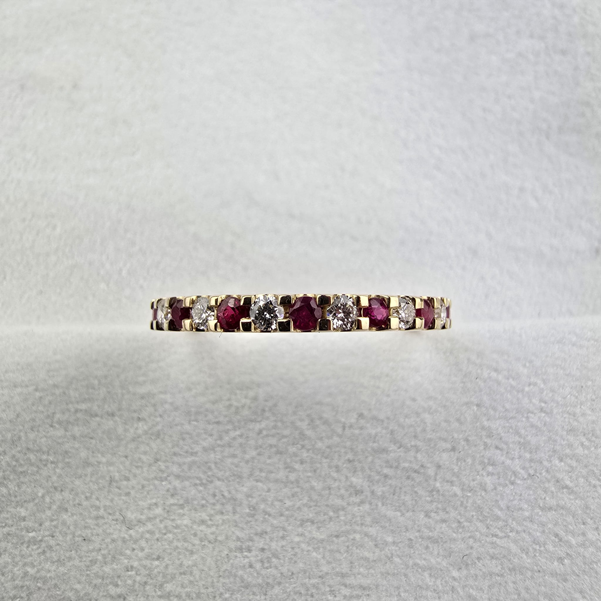 Ruby and diamond graduated eternity ring