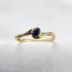 Round Sapphire Crossover Ring