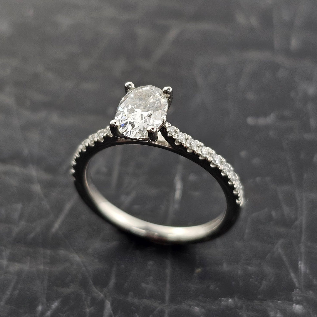 Oval Solitaire with Diamond Shoulders