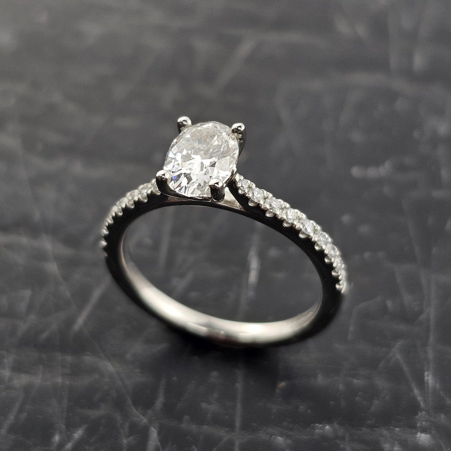 Oval Solitaire with Diamond Shoulders