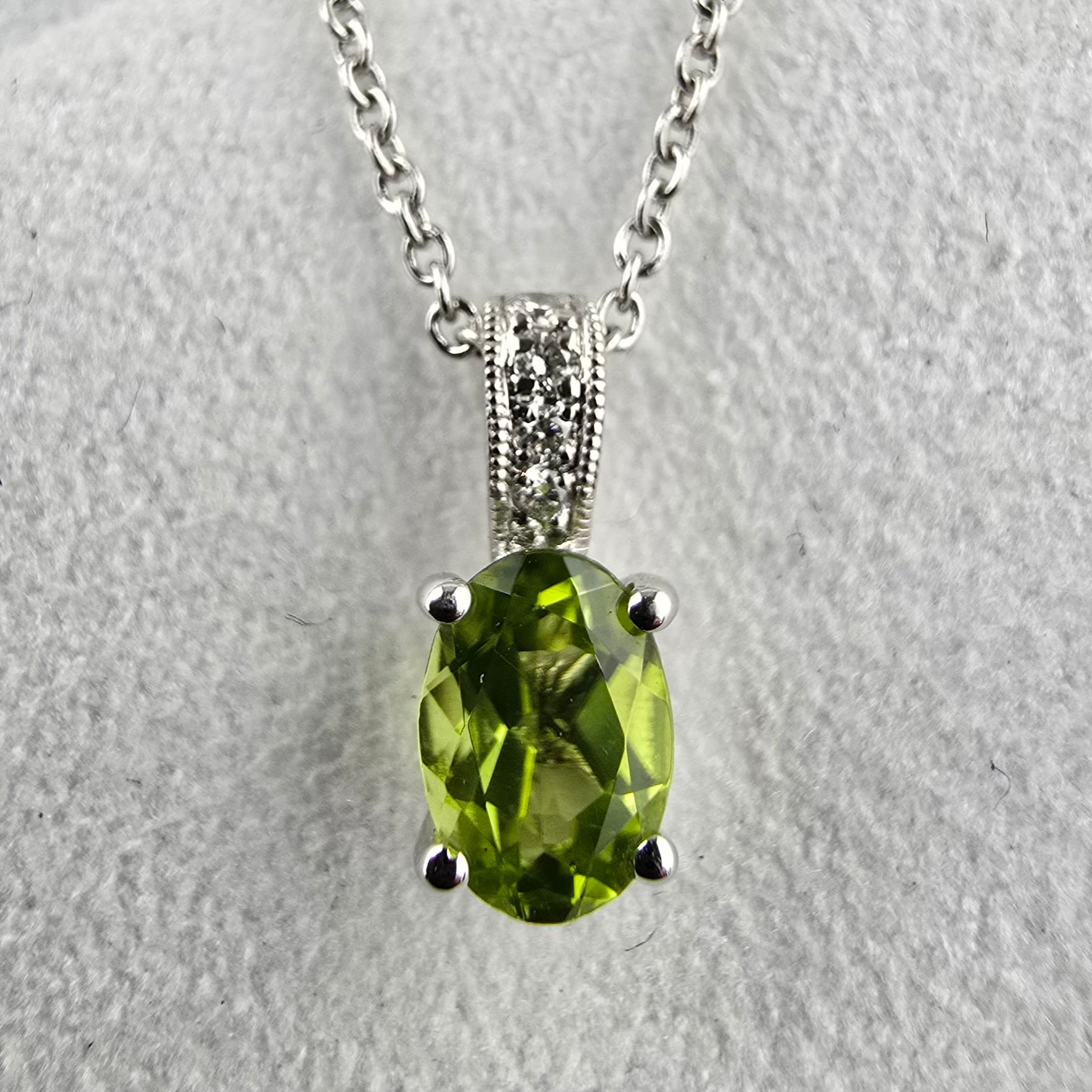 Oval Cut Claw Set Peridot Pendant
