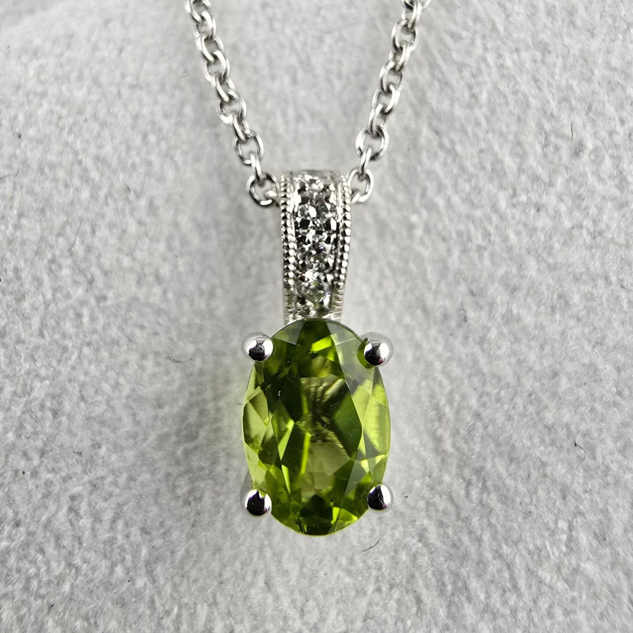 Oval Cut Claw Set Peridot Pendant