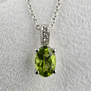 Oval Cut Claw Set Peridot Pendant