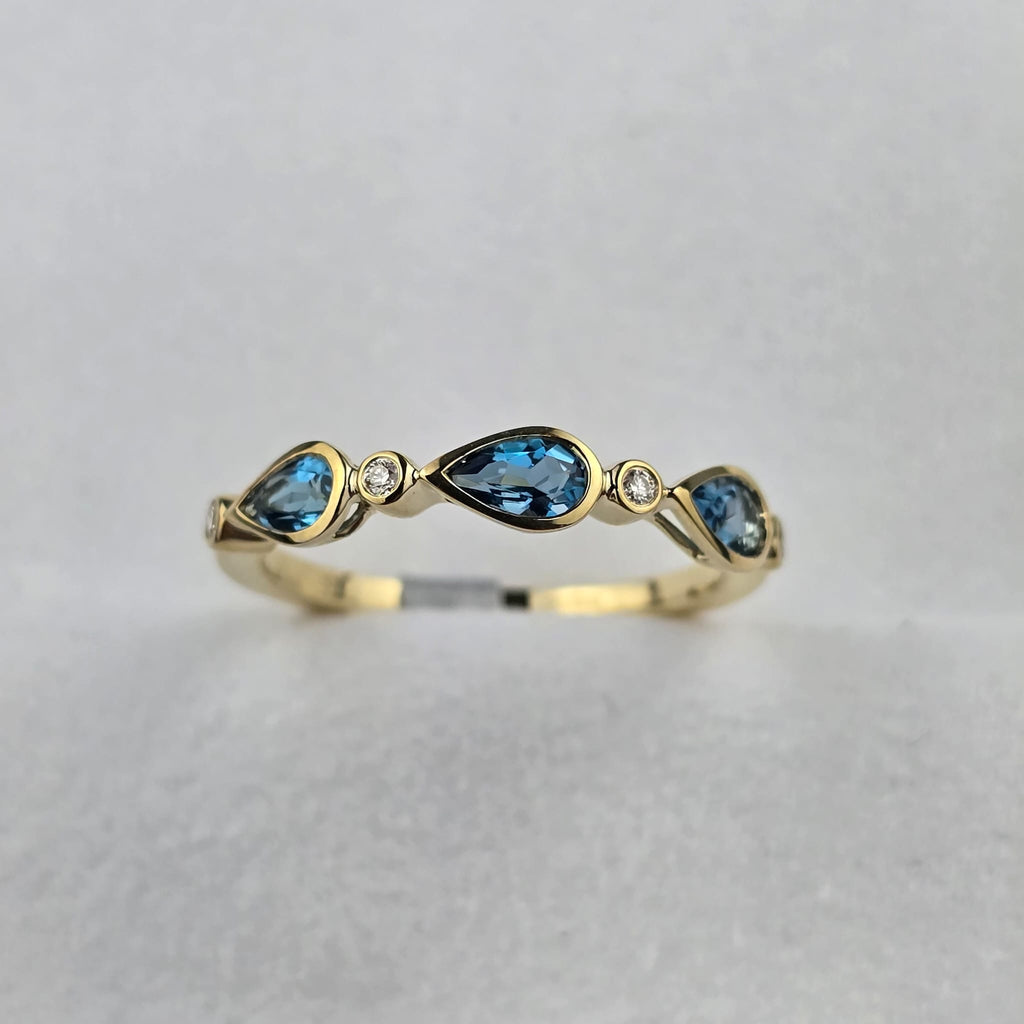 Blue Topaz and Diamond Ring