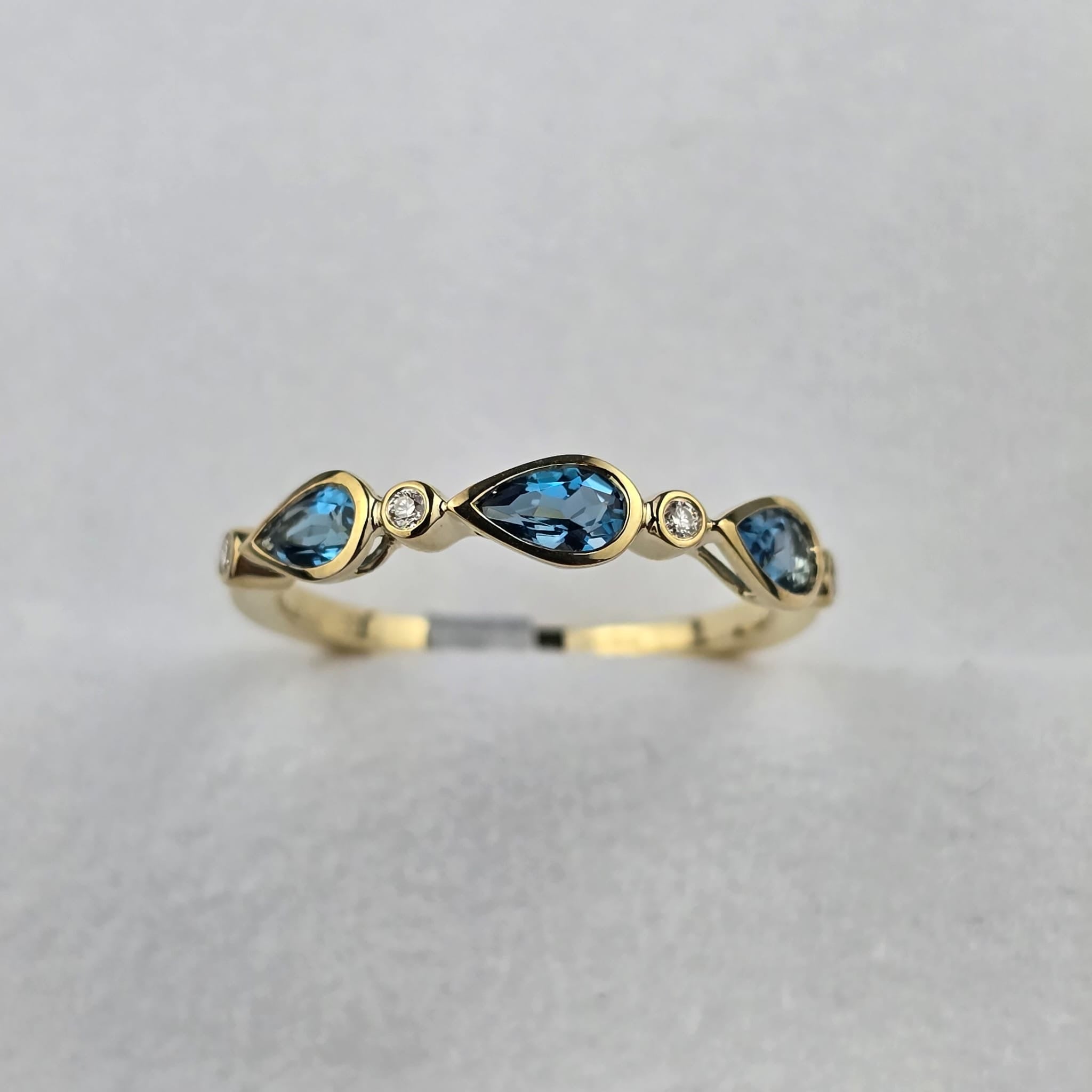Blue Topaz and Diamond Ring