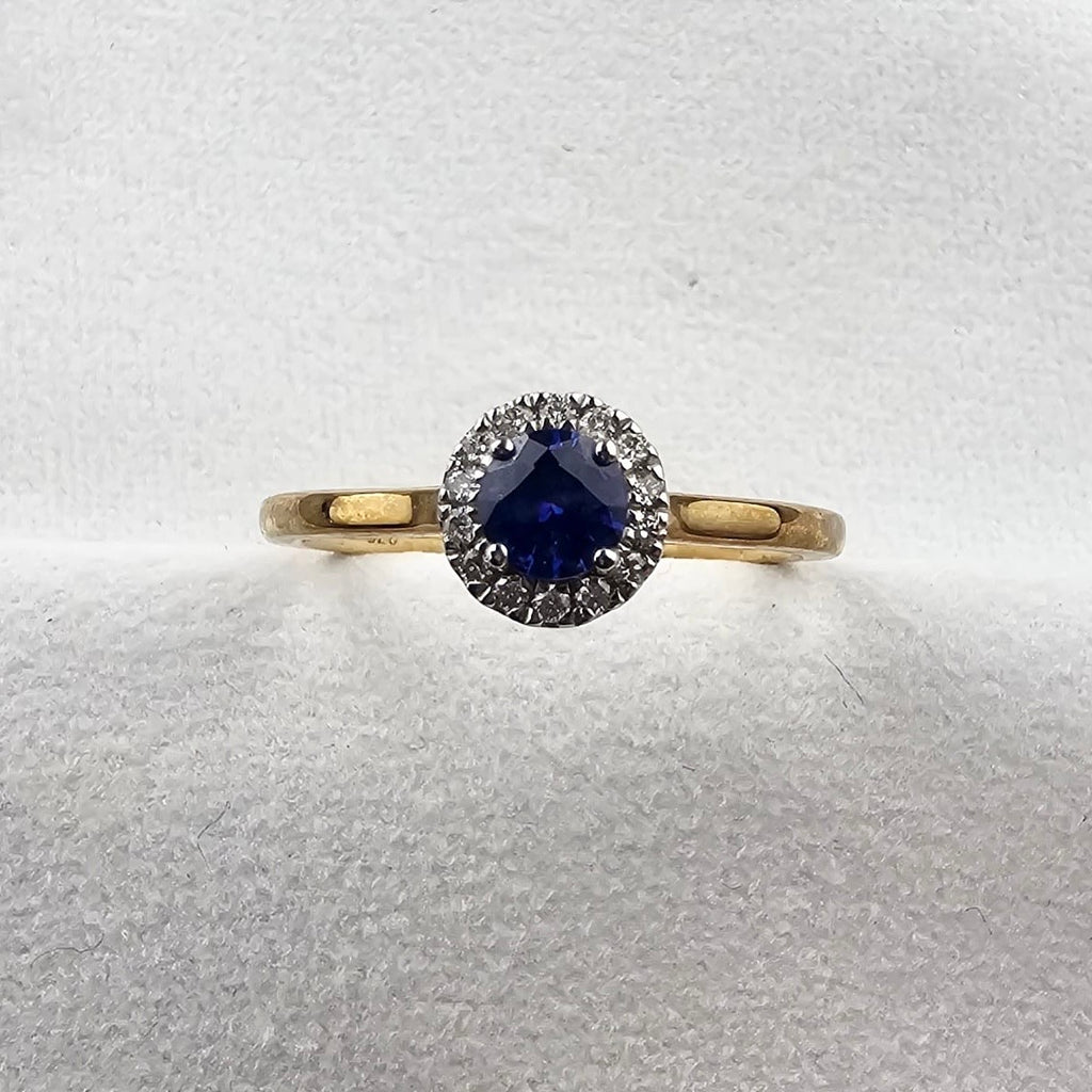 Round Sapphire and Diamond Halo Ring