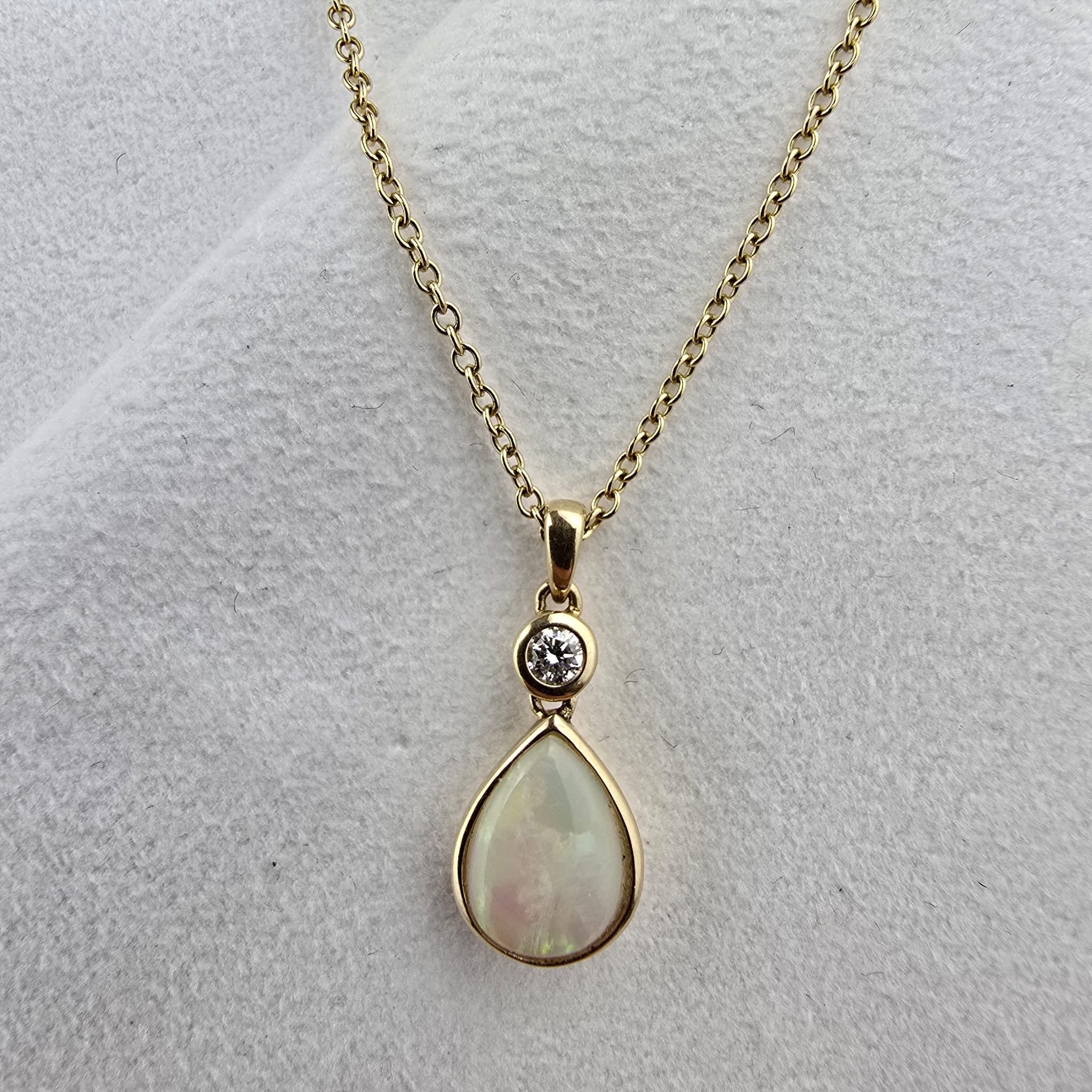 Pear cut opal pendant