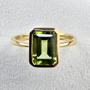 Octagonal Rubover Set Peridot ring