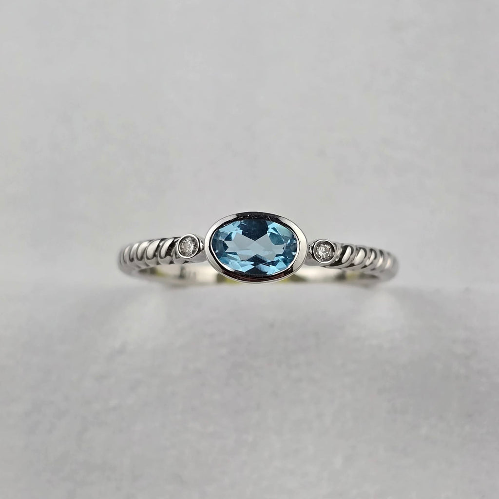 Blue Topaz Oval Rubover Ring