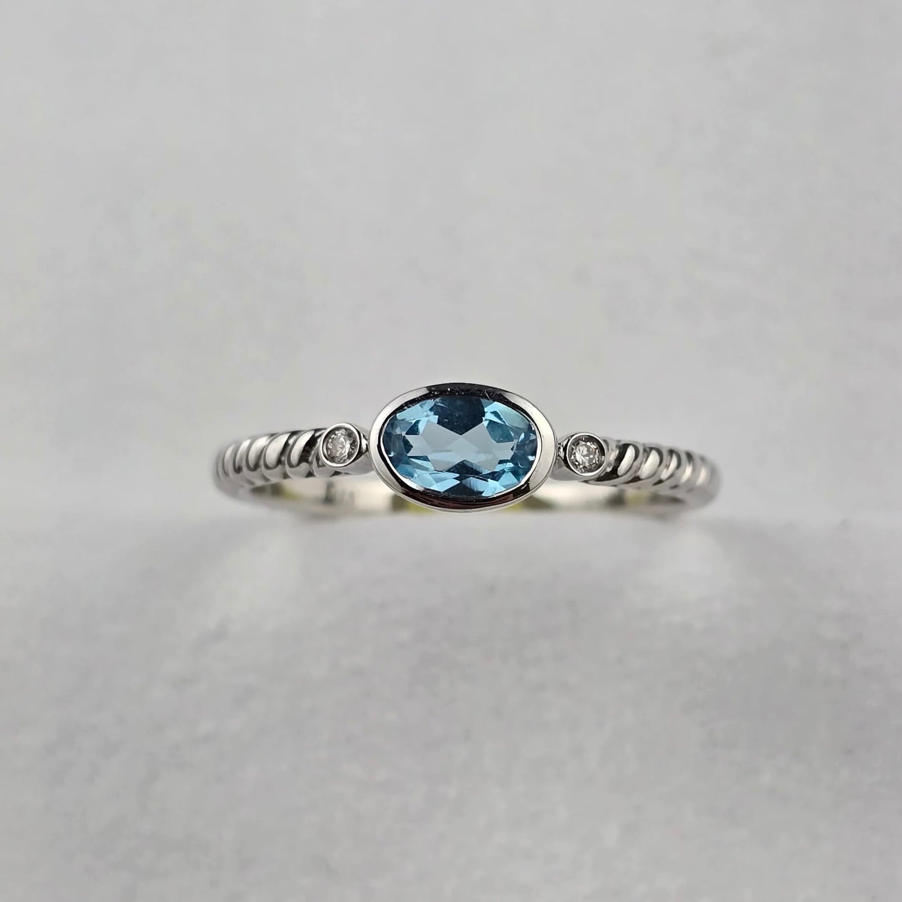 Blue Topaz Oval Rubover Ring