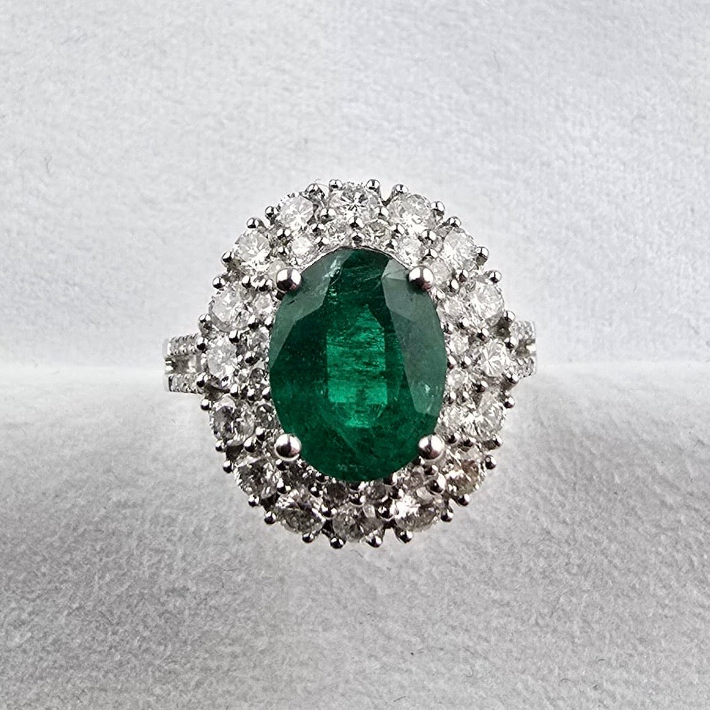 Oval Emerald and Diamond Double Halo