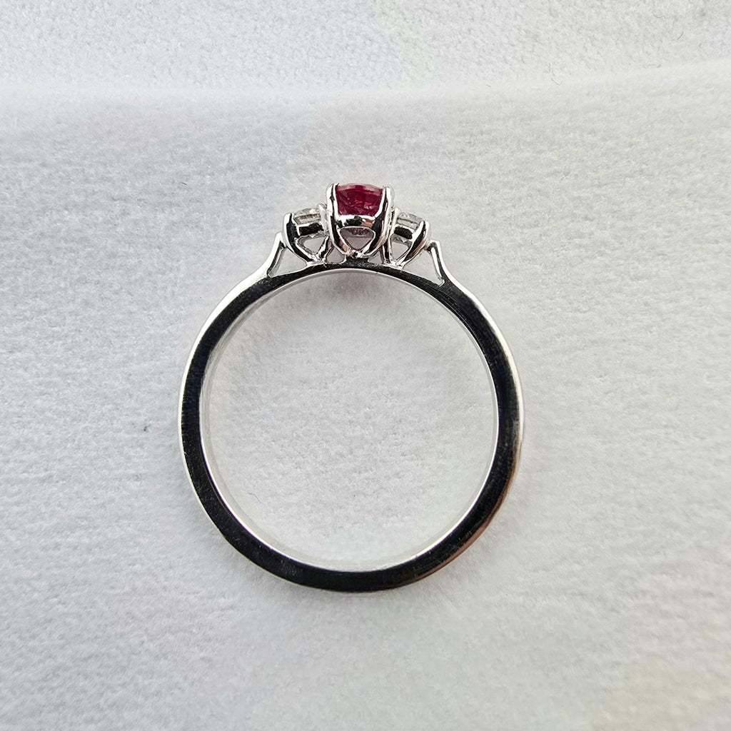 Oval ruby three stone ring