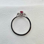 Oval ruby three stone ring