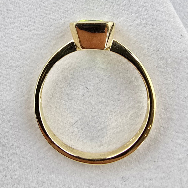 Octagonal Rubover Set Peridot ring