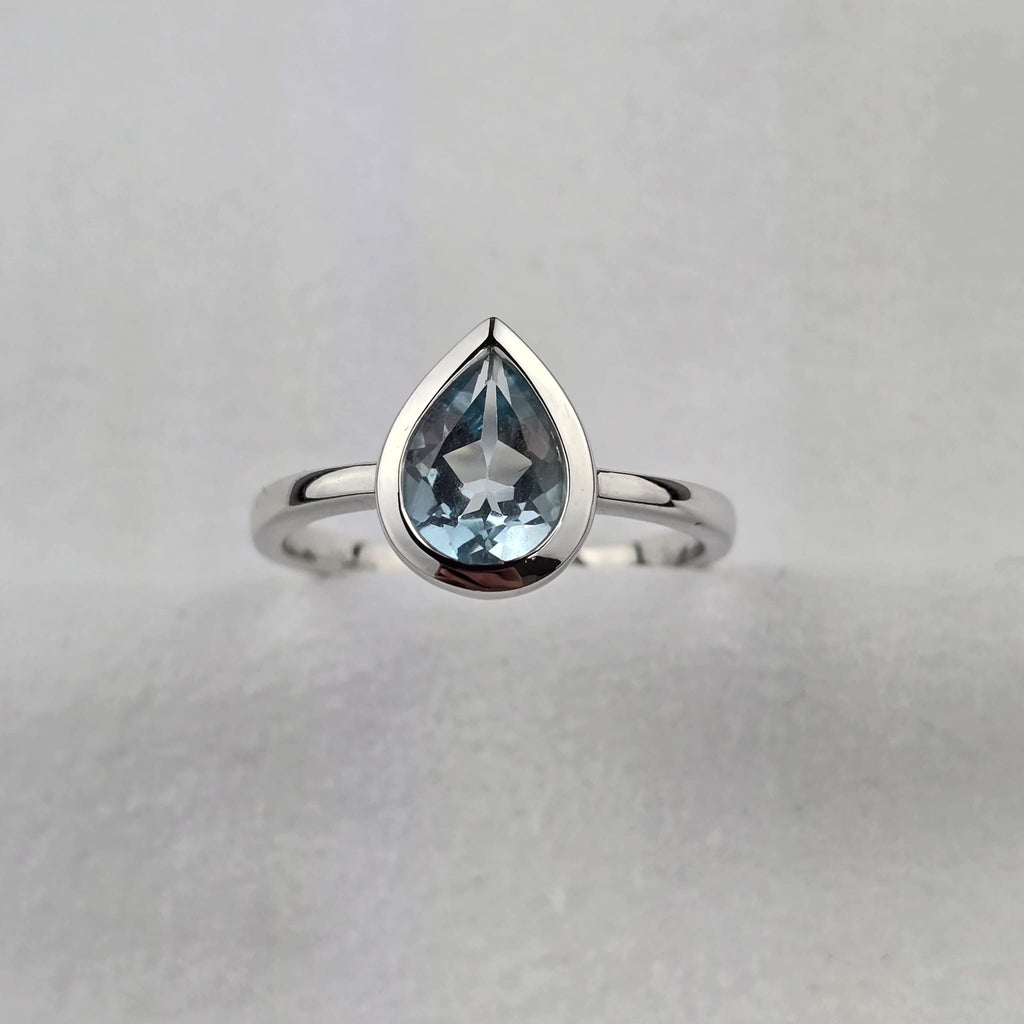 Blue Topaz Pear Rubover Ring