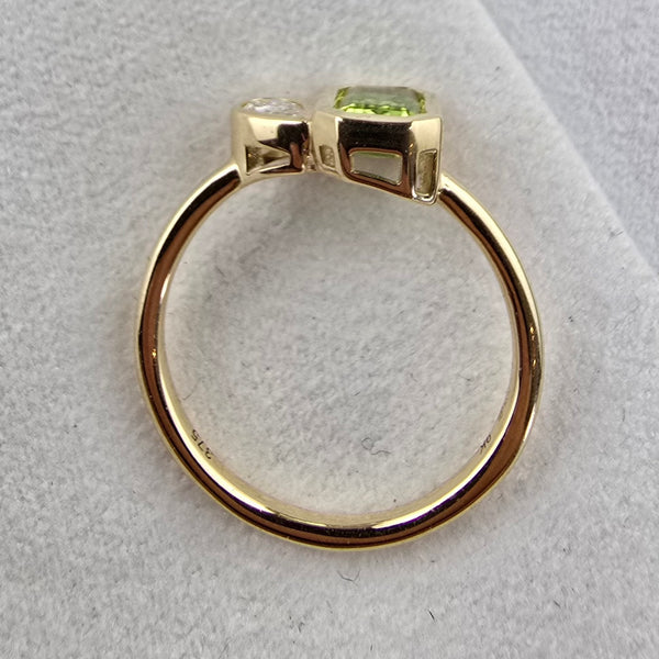 Toi et Moi Peridot and Diamond Ring