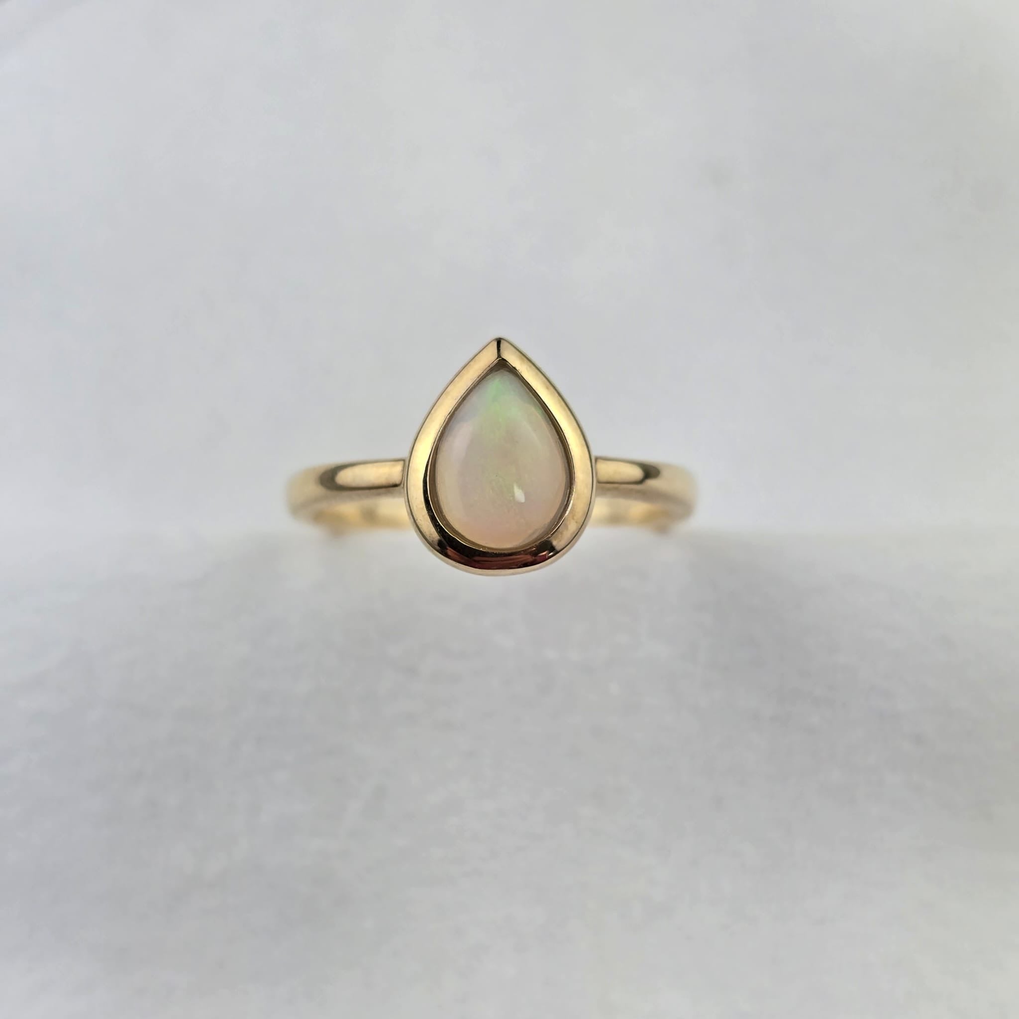 Opal Pear Solitaire Ring