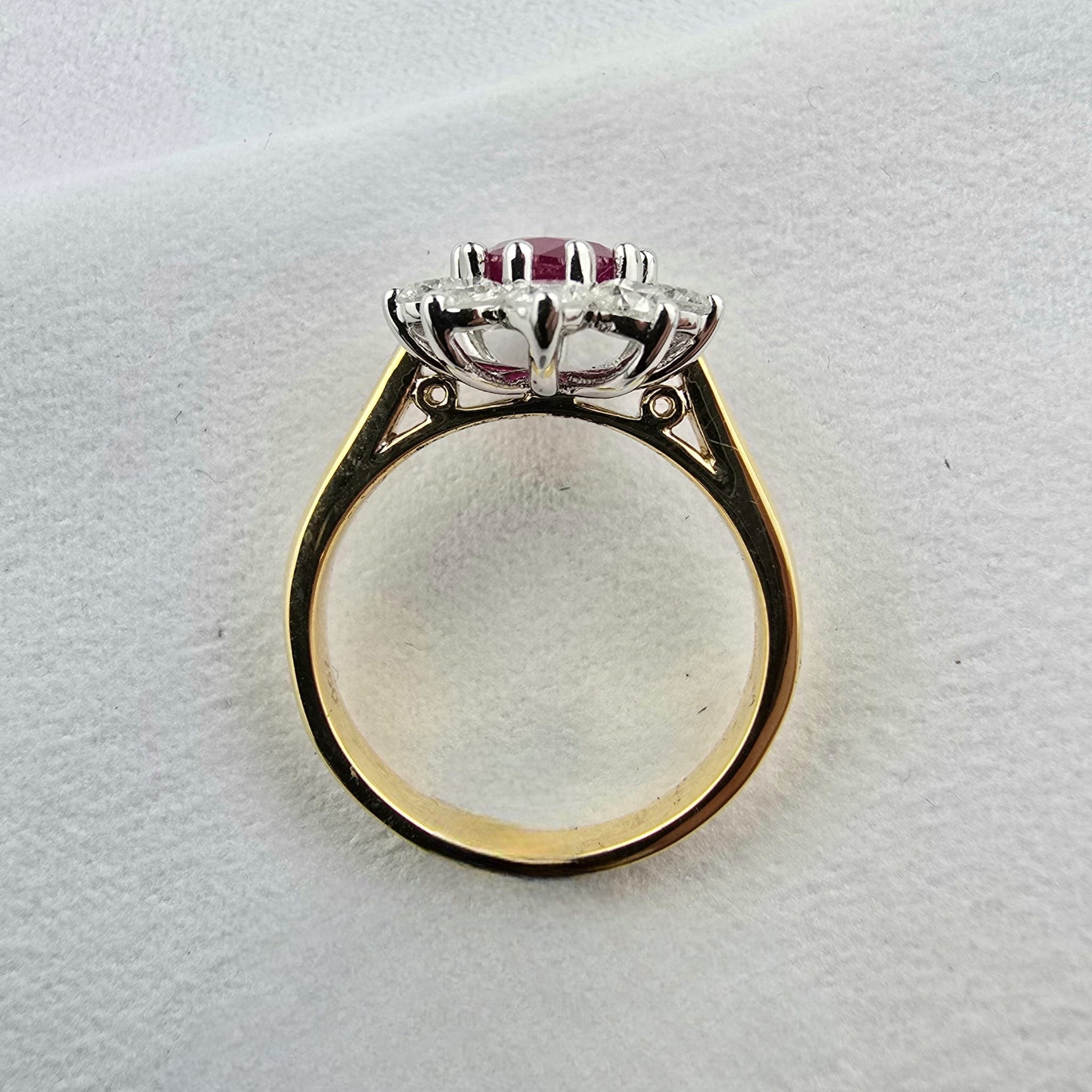 Emerald cut ruby and diamond cluster ring