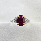 Large oval ruby trefoil ring