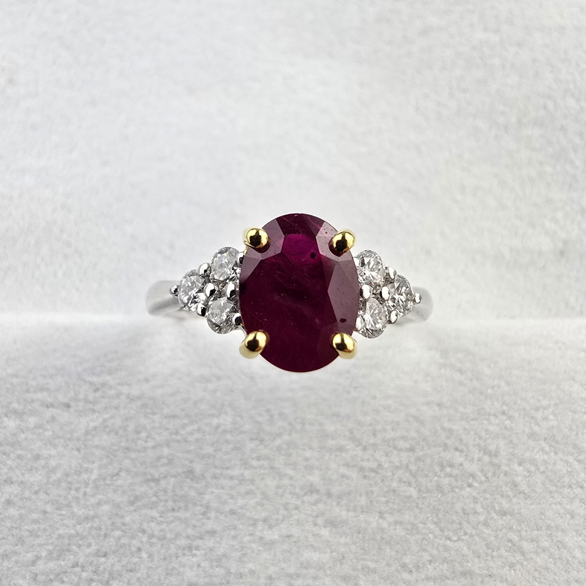 Large oval ruby trefoil ring