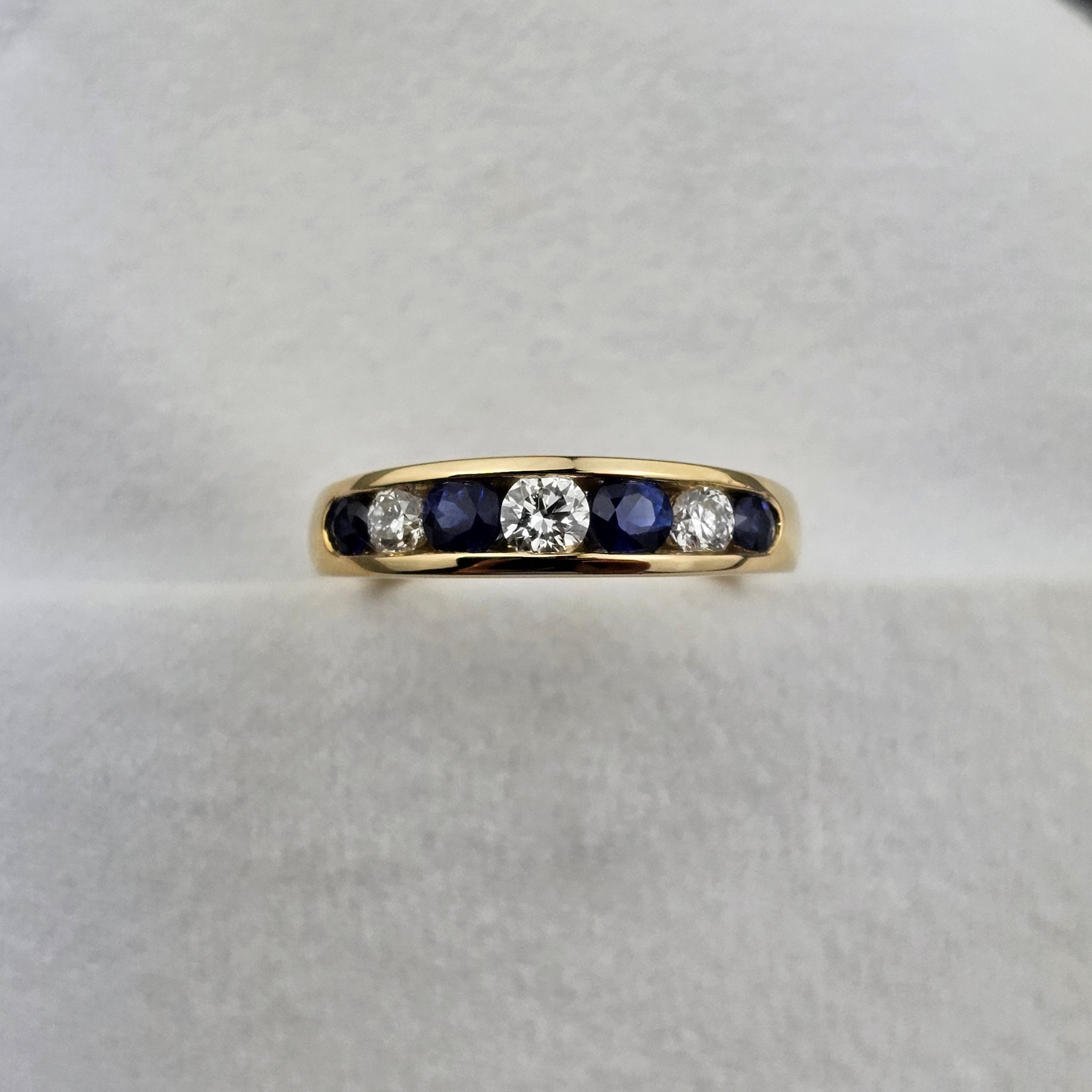 Sapphire and diamond channel eternity ring
