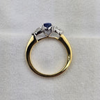 Oval sapphire and pear diamond three stone ring