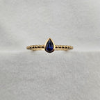 Pear sapphire beaded ring