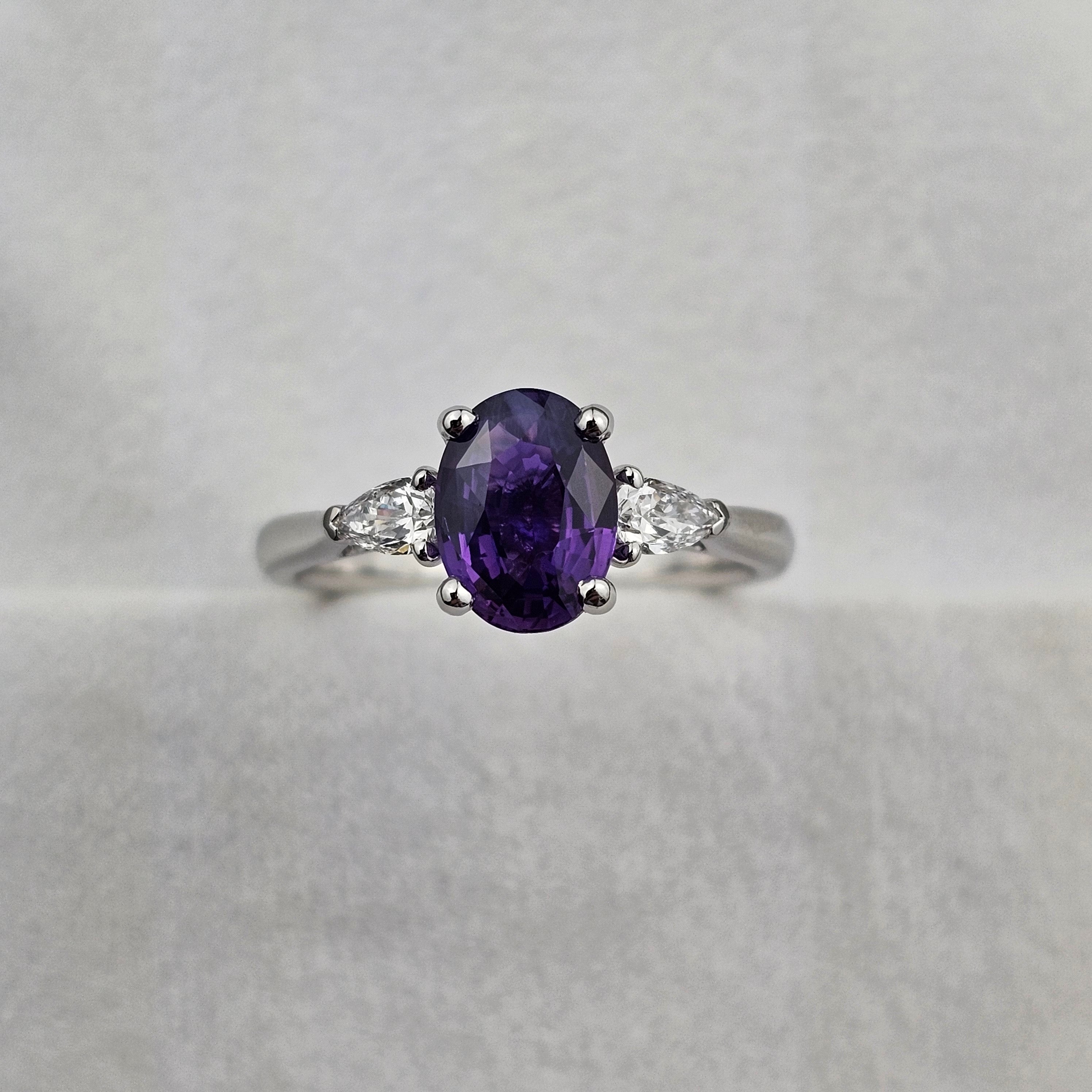 Purple Oval Cut Purple Sapphire Ring With Pear Shape Diamond Shoulders