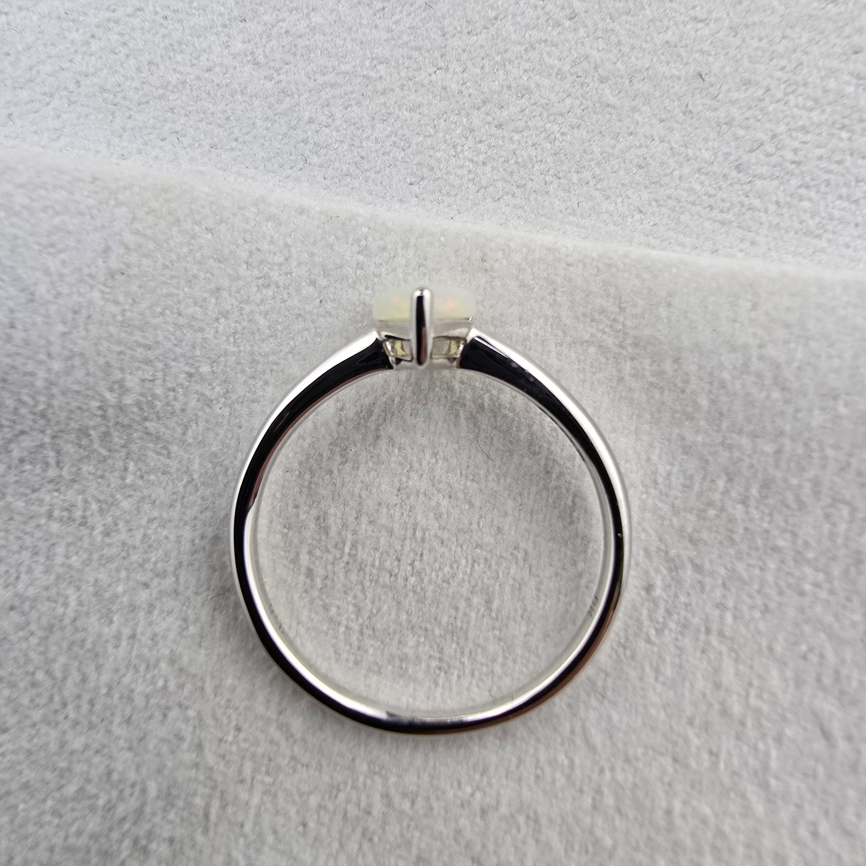 Pear Cut Opal Solitaire Ring