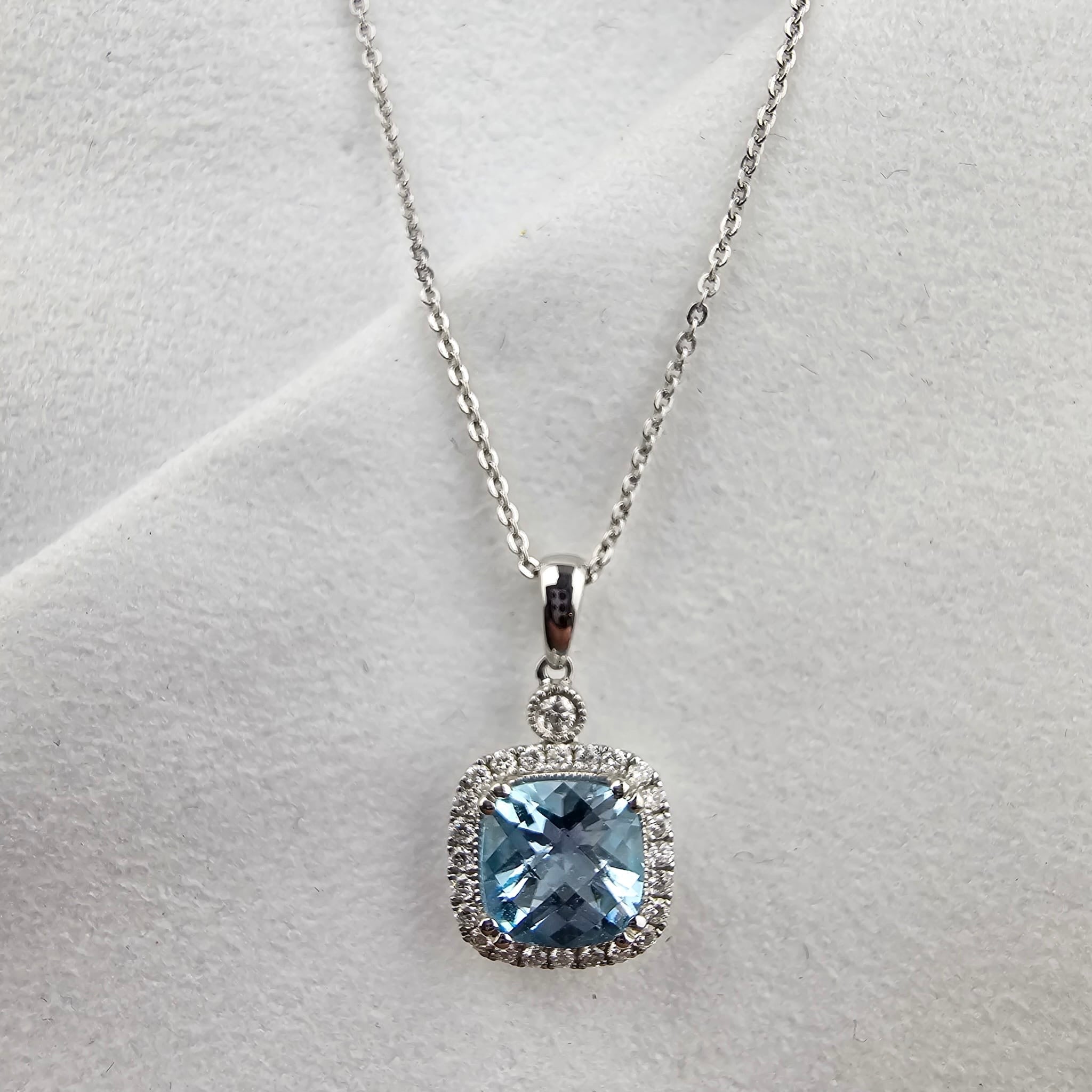 Cushion Blue Topaz Halo Pendant