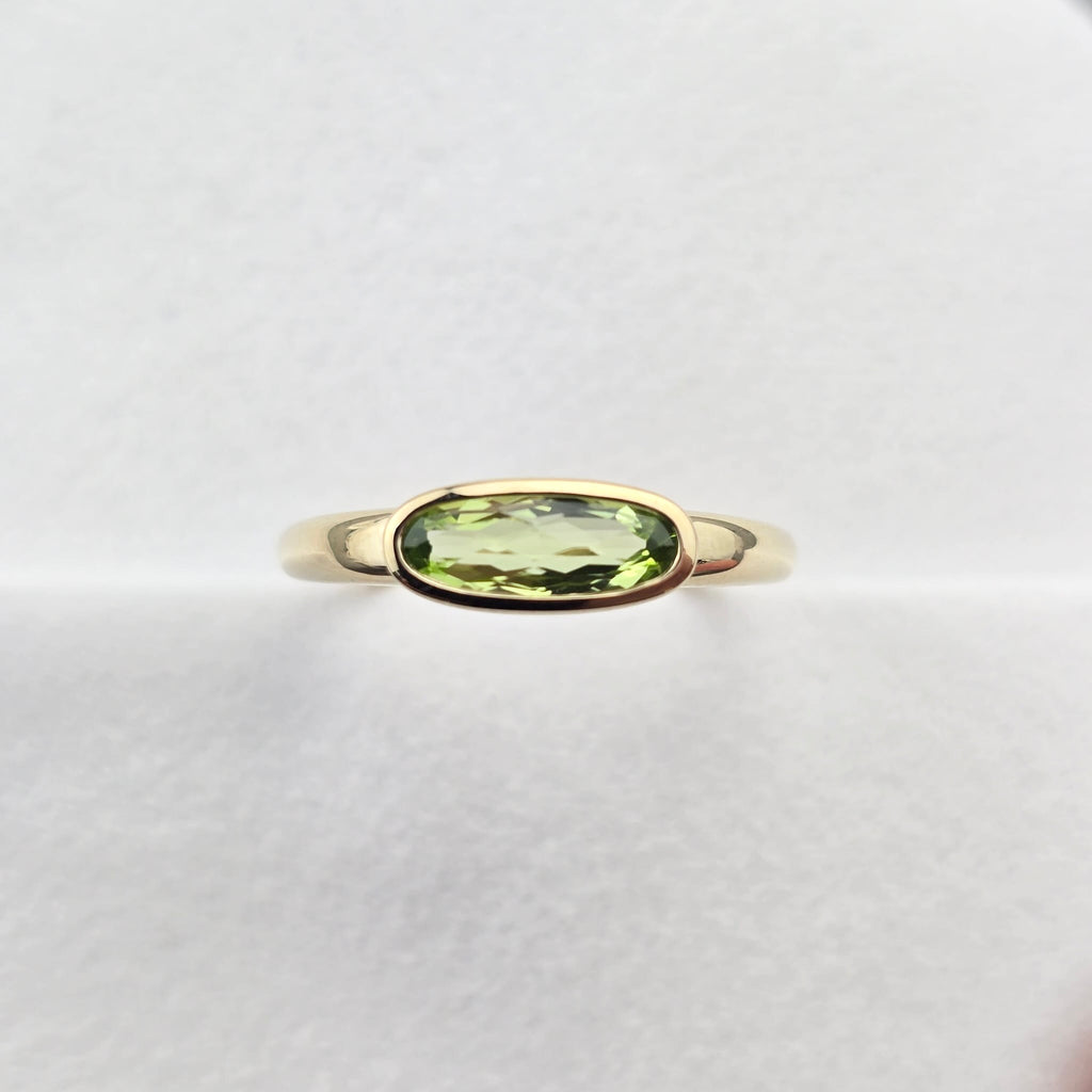 Oval Peridot Rubover Set Dress Ring