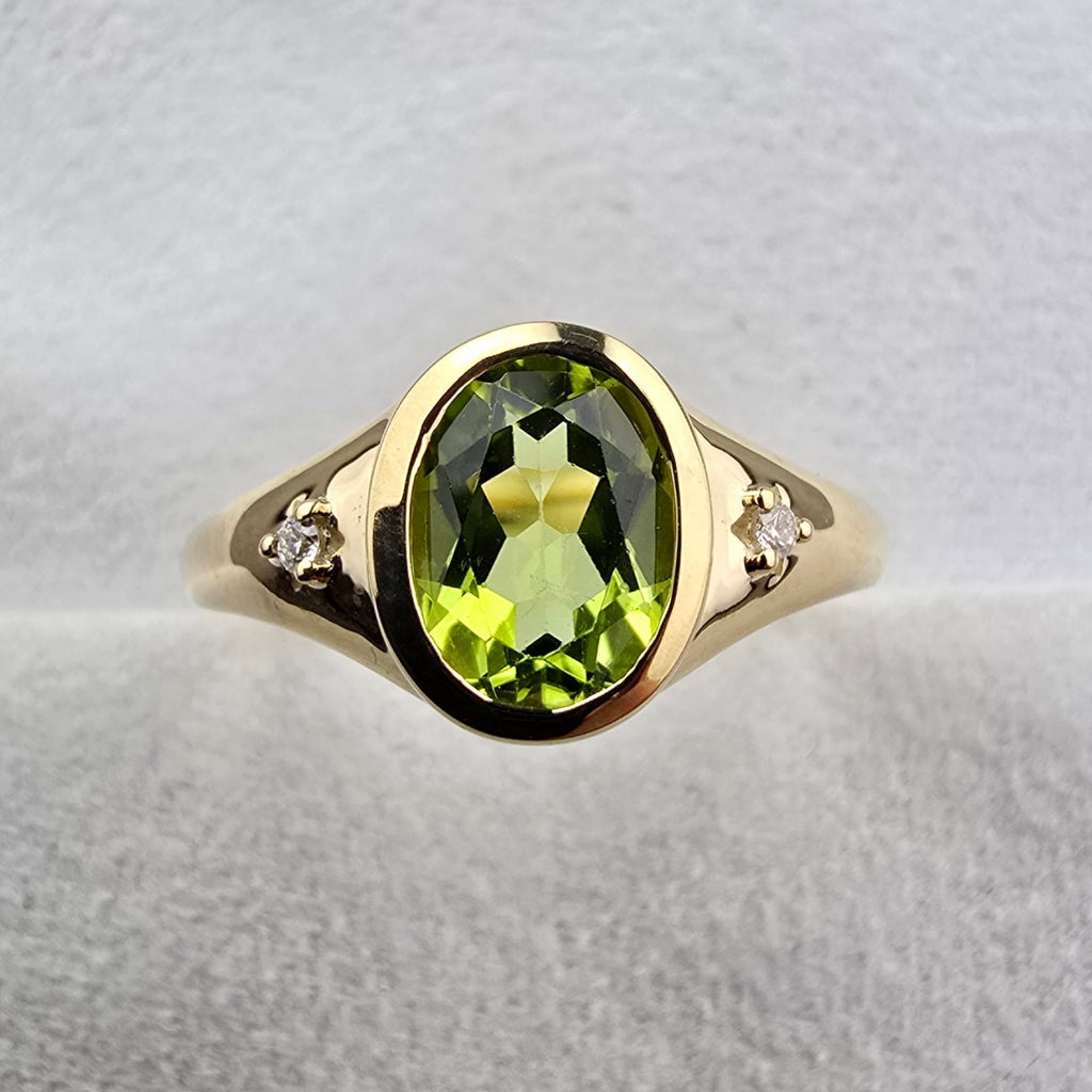 Oval Peridot and Diamond Ring