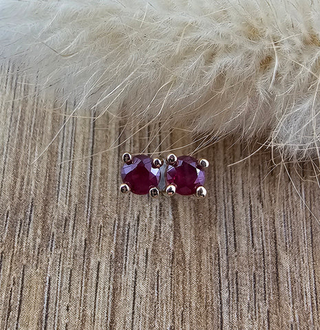 Claw set ruby stud earrings