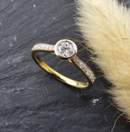 Round diamond rubover solitaire engagement ring