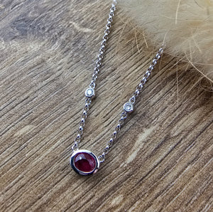 Small oval ruby pendant